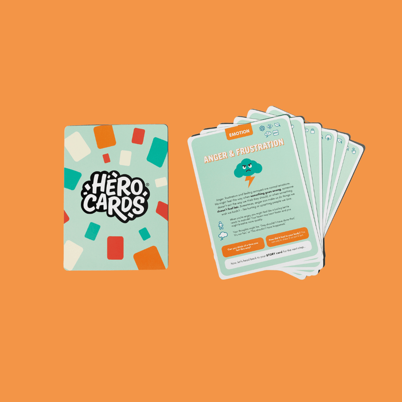 Green Story Cards from Hero Cards packaging with cards on an orange background